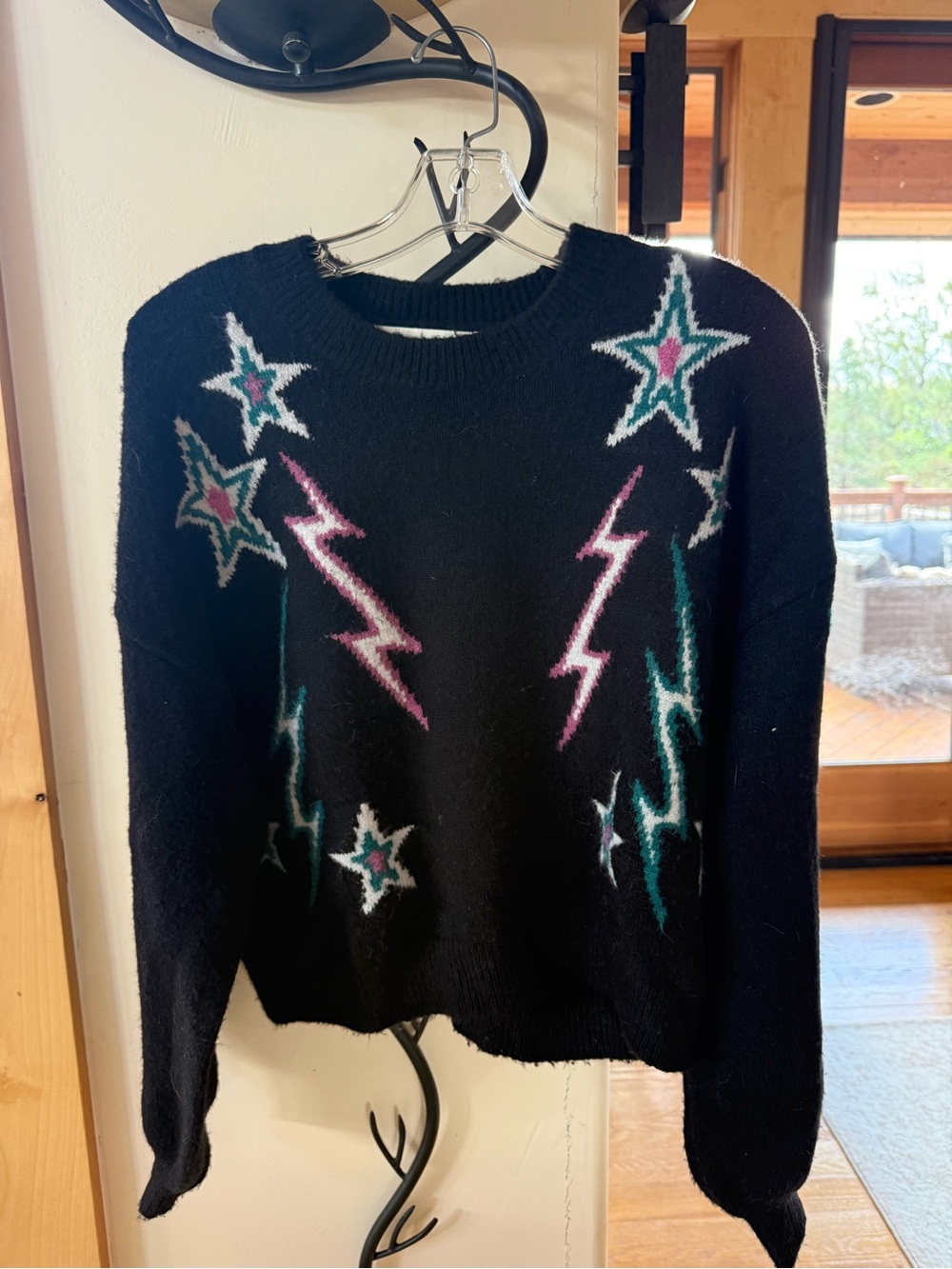 saltwater LUXE Black Crewneck Sweater with Pink & Teal Star and Lightning Motifs